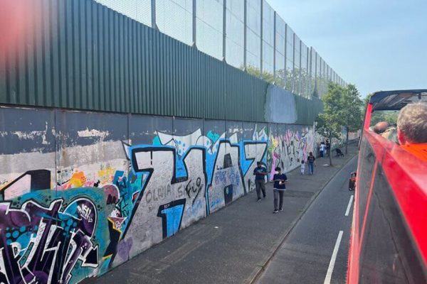 A Painting Changed My Itinerary: Experiencing the Magic of Street Art in Belfast